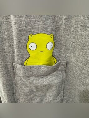 Gray Short Sleeve Tee with Yellow Cartoon Pocket Graphic